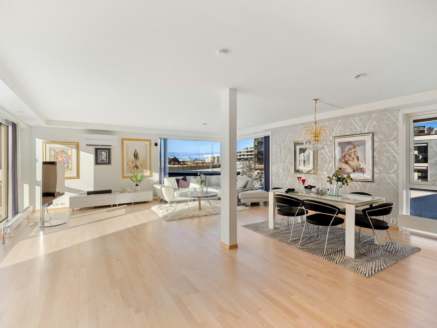 Bright living room with wood flooring